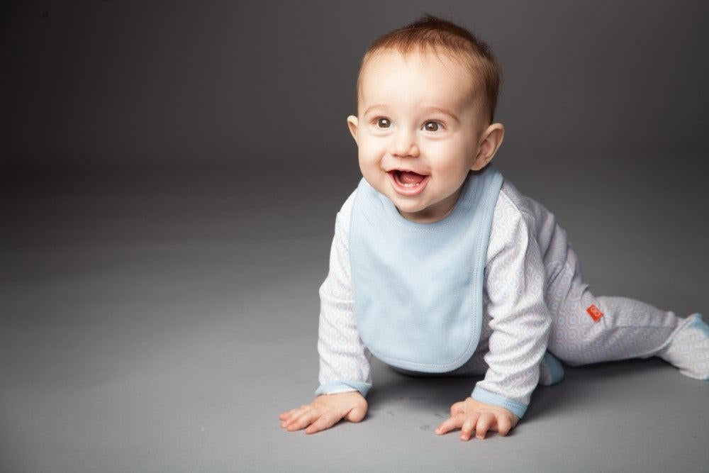our bibs are a new baby staple. here's why...