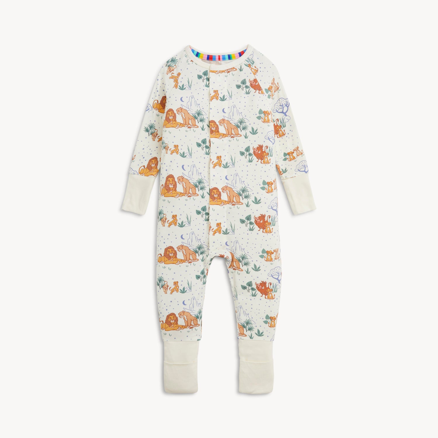 A cream-colored long-sleeve coverall featuring a repeating pattern of Disney Pumbaa, Simba, and Nala among savanna trees and blue stars by Magnetic Me.