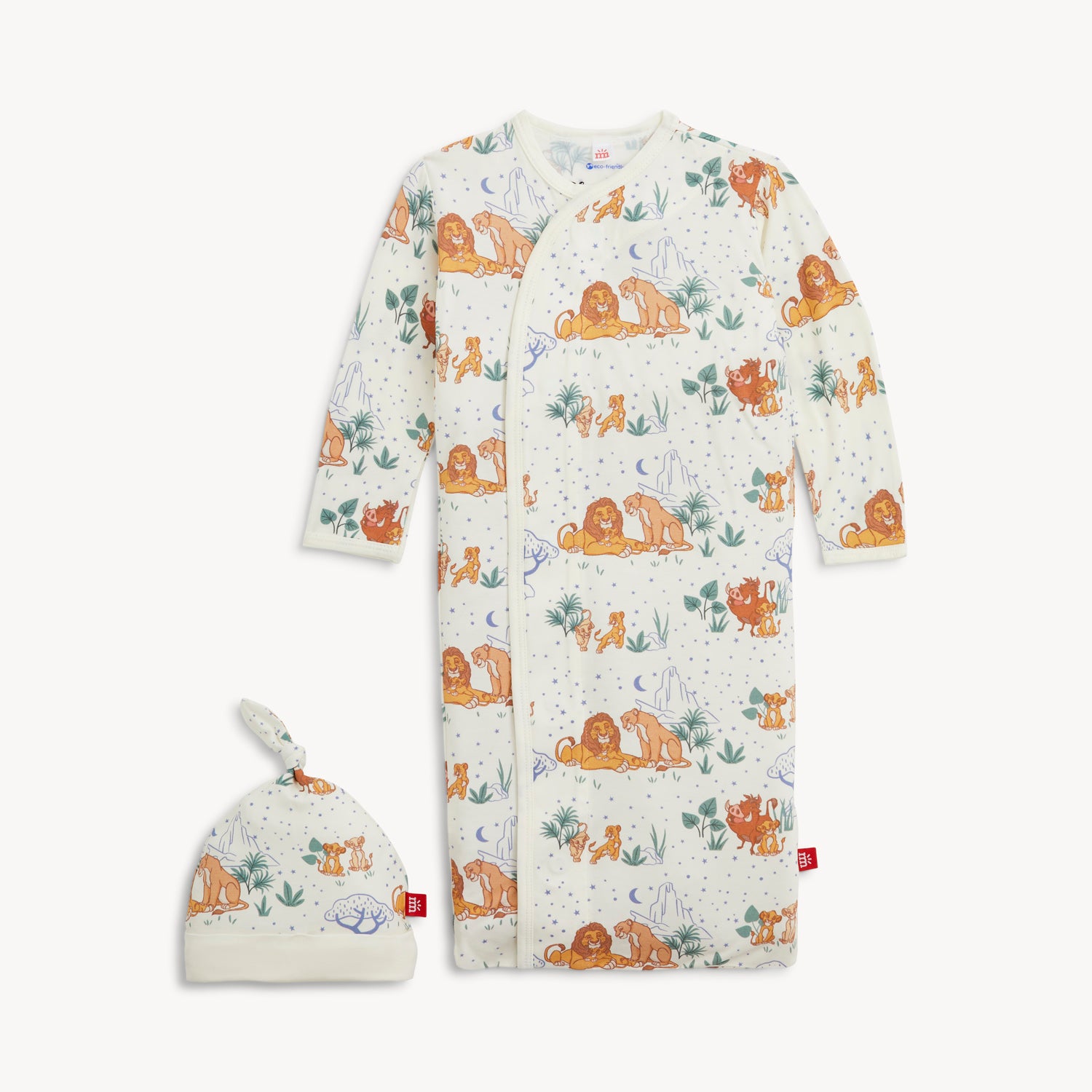 A cream-colored infant sleeper gown and matching knotted beanie set featuring a pattern of Disney Lion King characters under a crescent moon and stars by Magnetic Me.