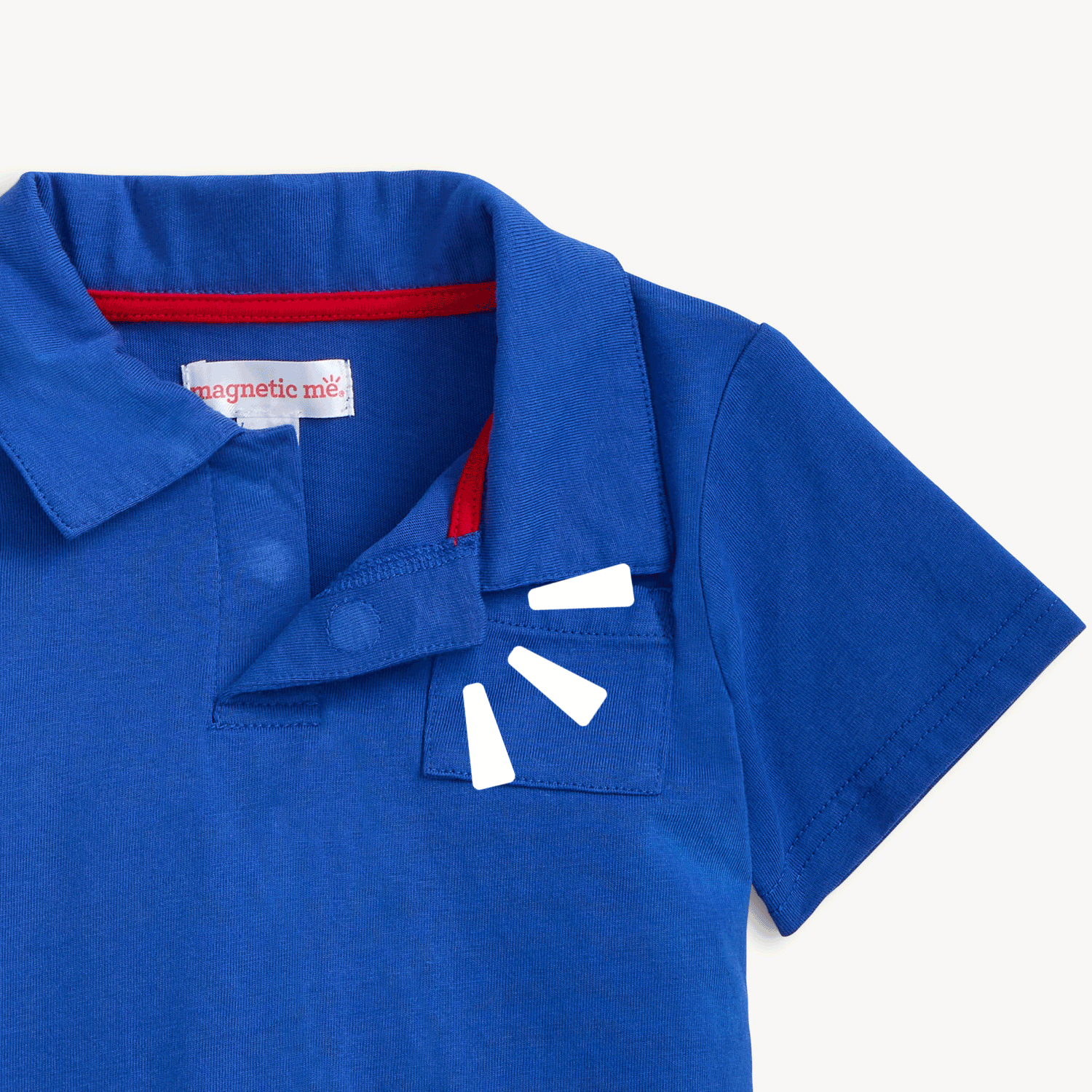 Open magnet on the top of the solid royal blue short-sleeve polo shirt, by Magnetic Me.