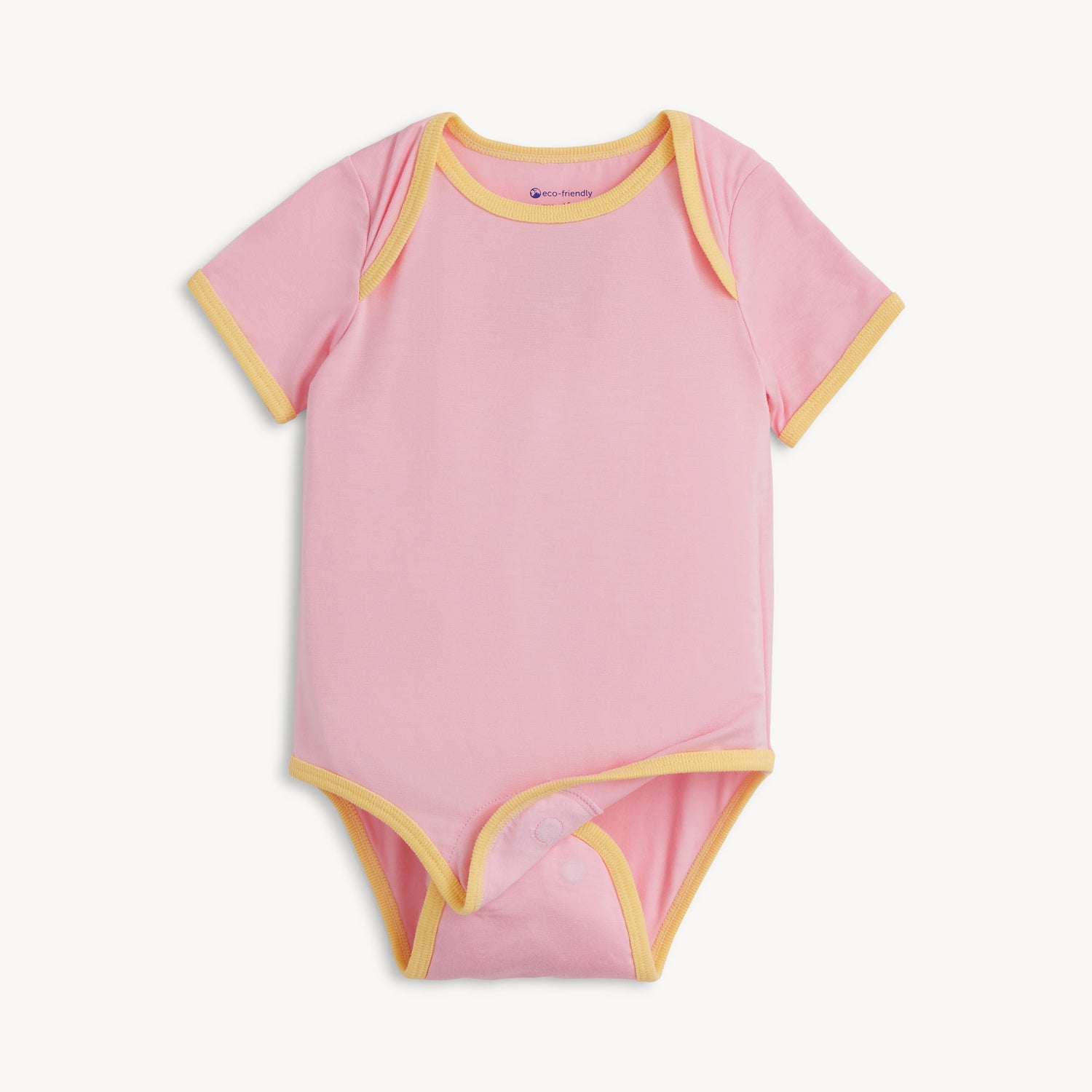 A  pink short-sleeve bodysuit with yellow trim, by Magnetic Me.