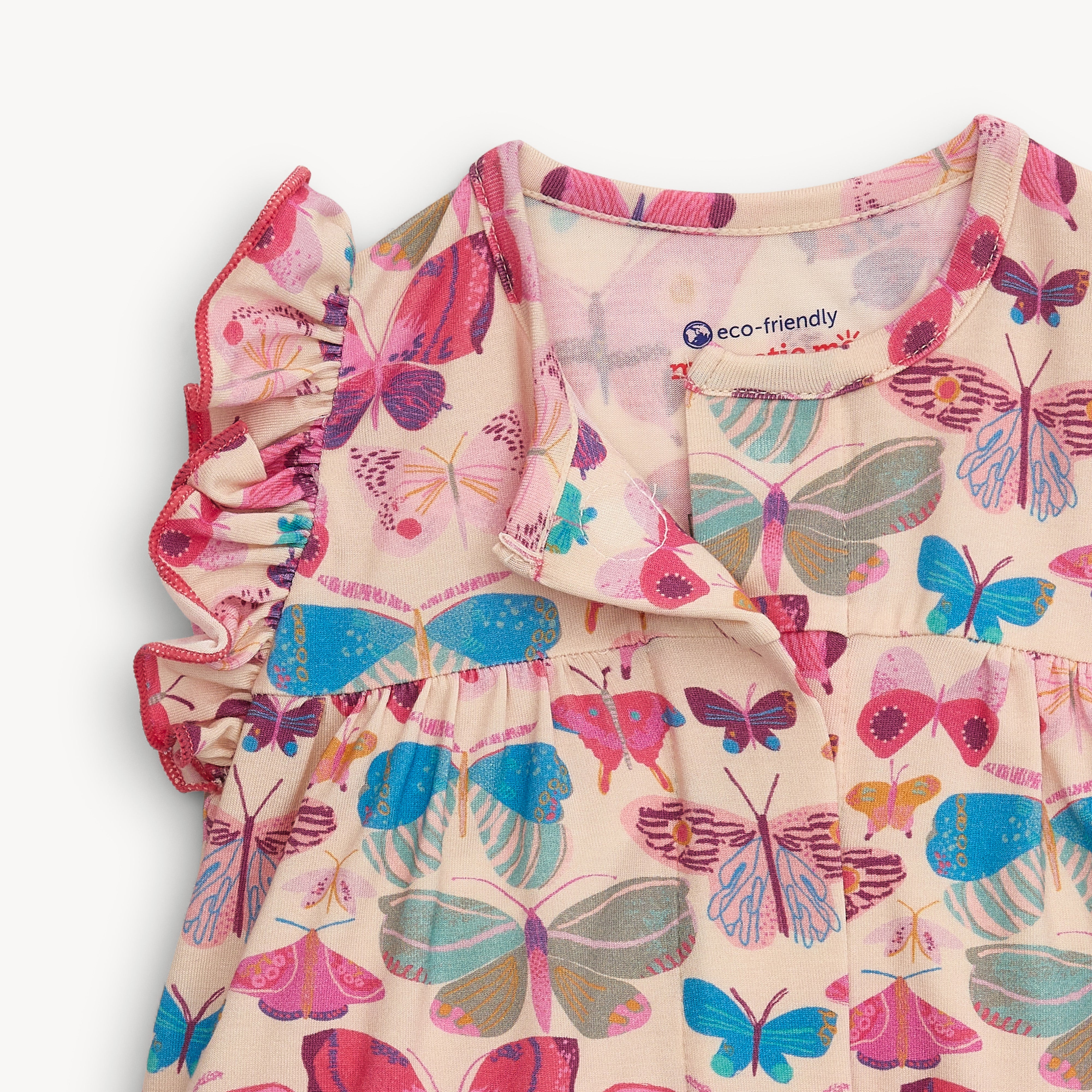 all a-flutter modal magnetic ruffle sleeve romper - re-loved