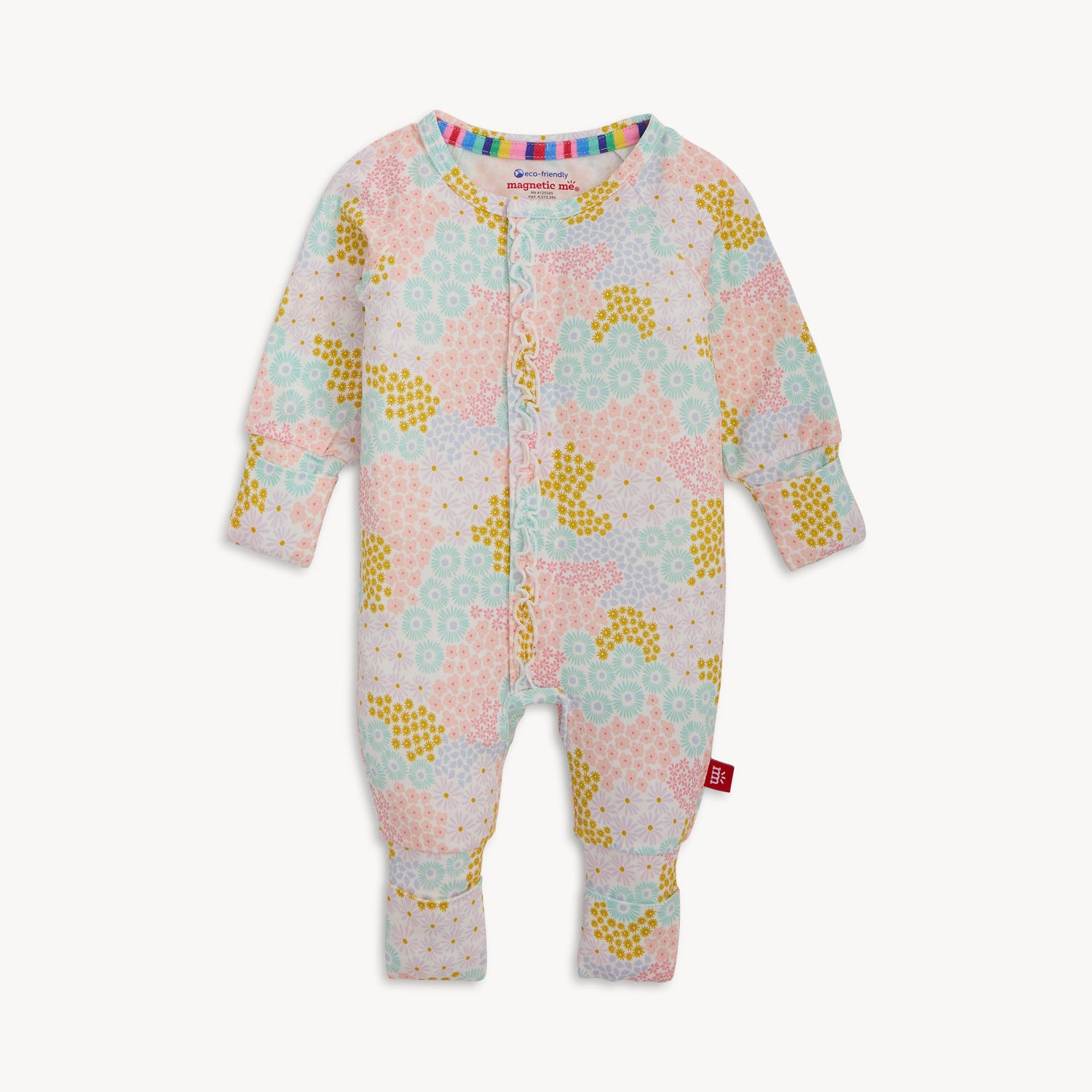 A long-sleeve convertible coverall with ruffle detailing and a multi-colored pastel floral pattern, by Magnetic Me.
