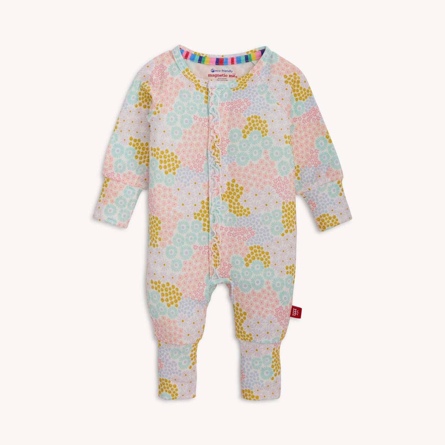A long-sleeve convertible coverall with ruffle detailing and a multi-colored pastel floral pattern, by Magnetic Me.