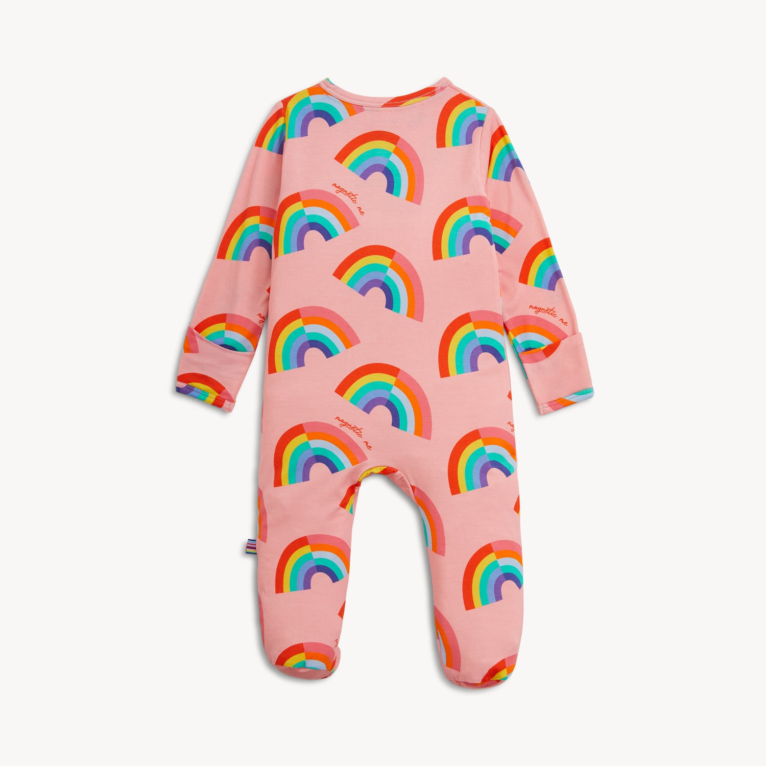 Back of A long-sleeve pink footie featuring a repeating pattern of vibrant, multi-colored rainbows, by Magnetic Me.