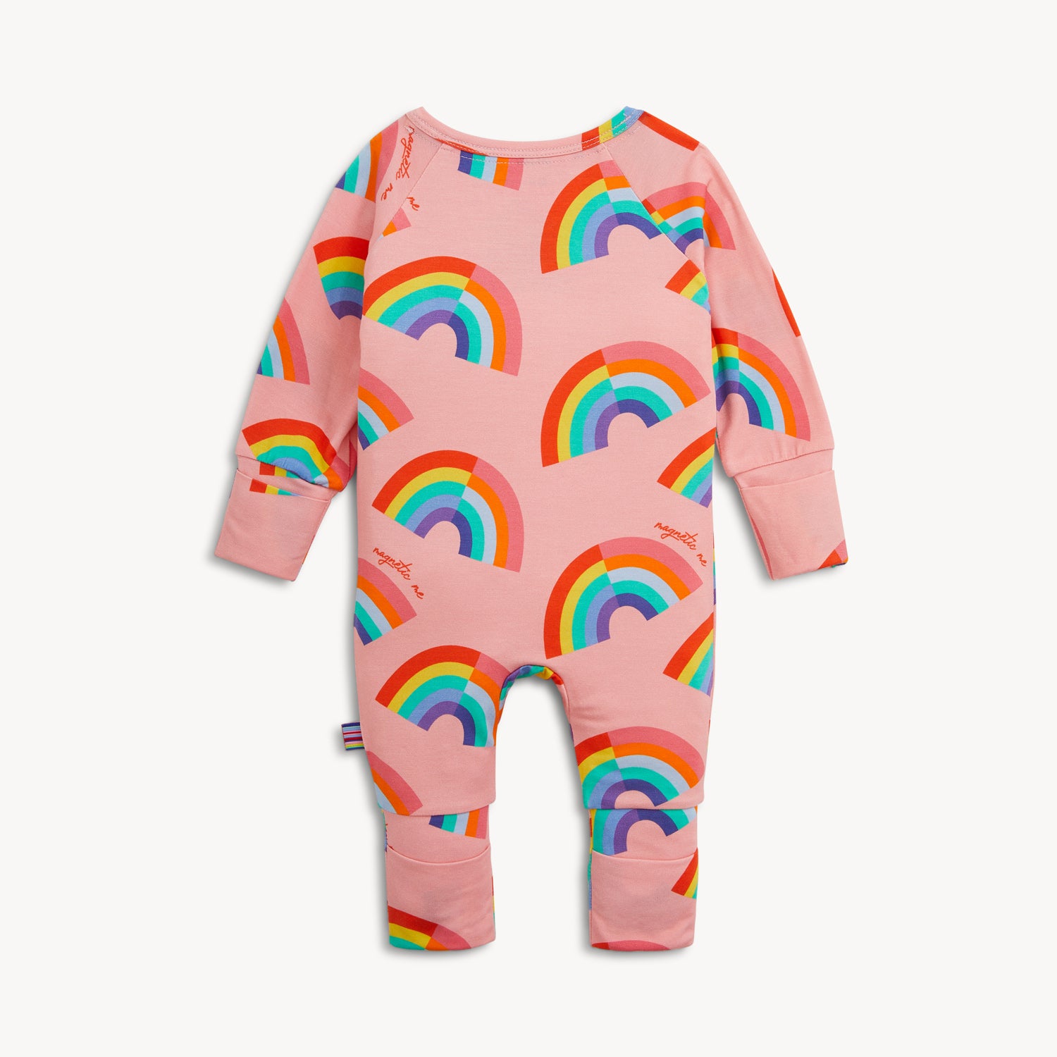 Back of A pink long-sleeve convertible coverall decorated with a colorful all-over rainbow print and ribbed cuffs, by Magnetic Me.