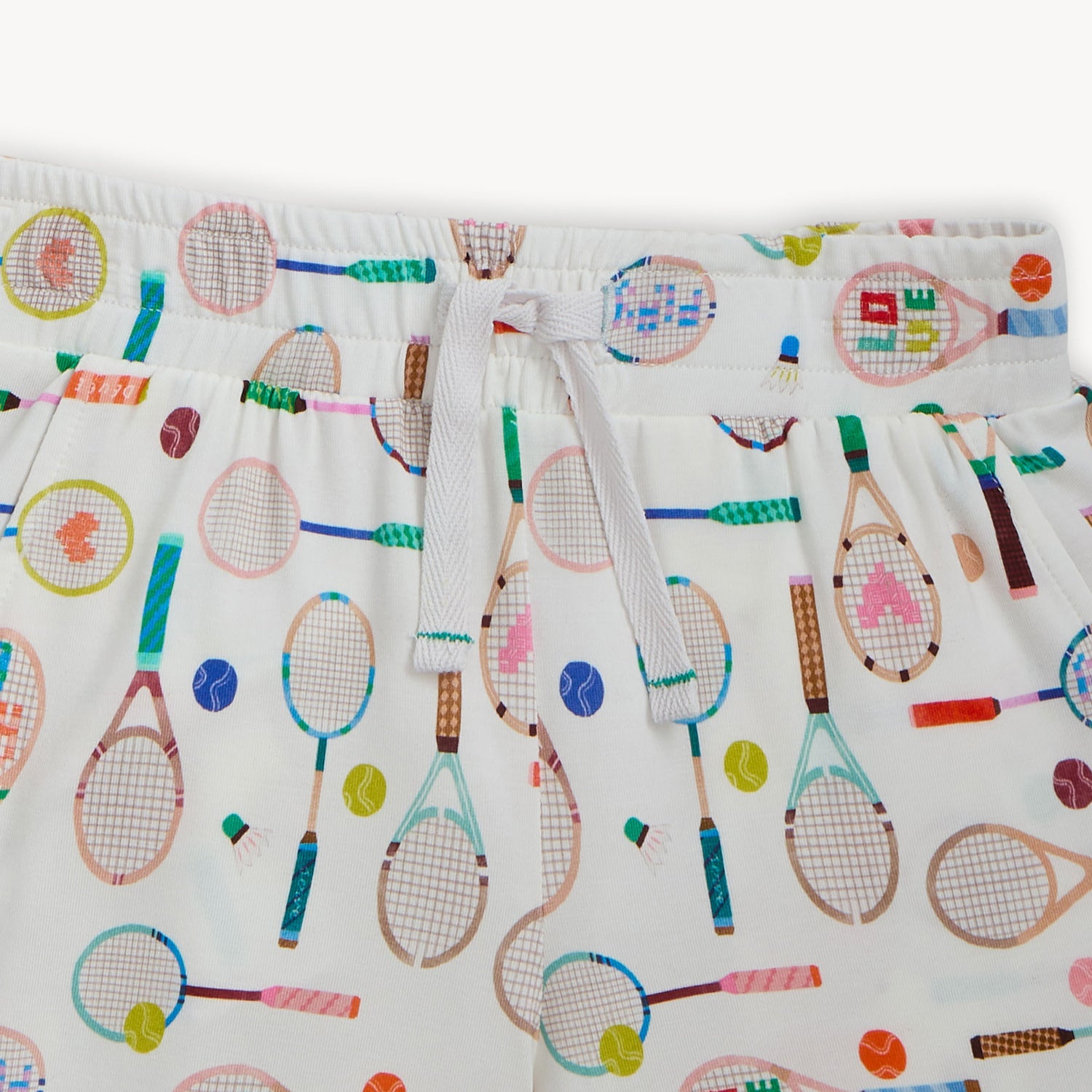 Shorts with colorful tennis racket pattern, by Magnetic Me.