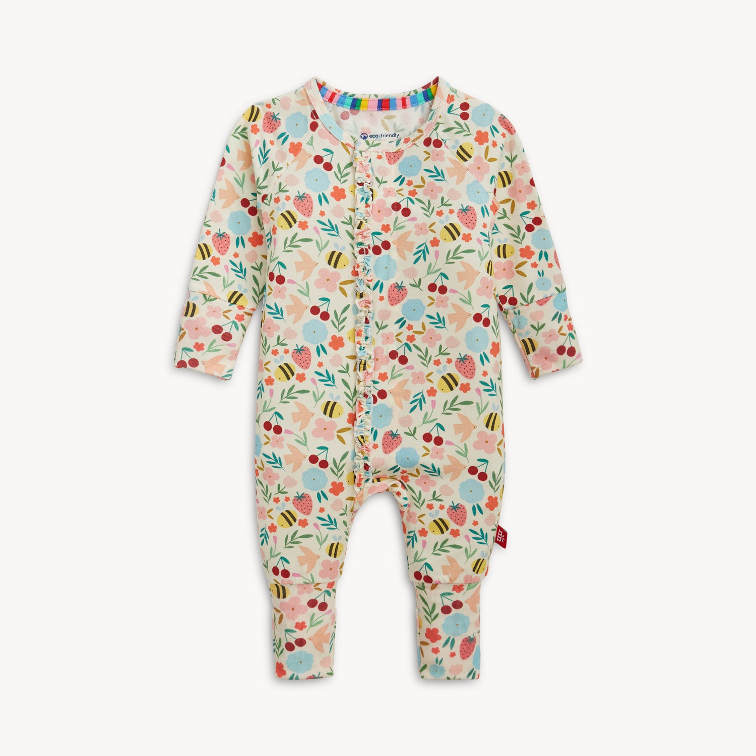 A long-sleeve convertible coverall featuring a vibrant bee and botanical garden print with a ruffled magnetic front, by Magnetic Me.