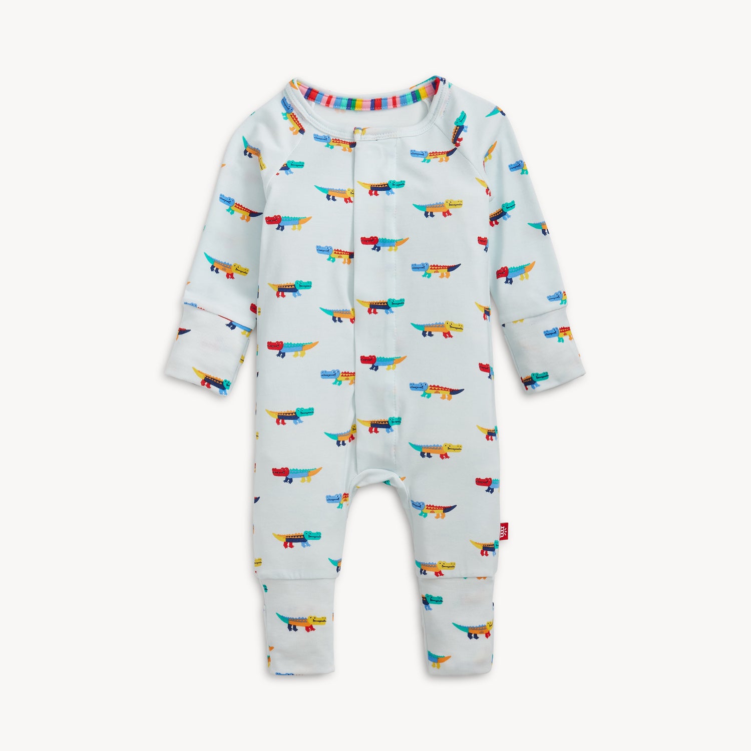 A long-sleeve convertible coverall in light blue featuring an all-over print of colorful, stylized crocodiles and ribbed cuffs, by Magnetic Me.