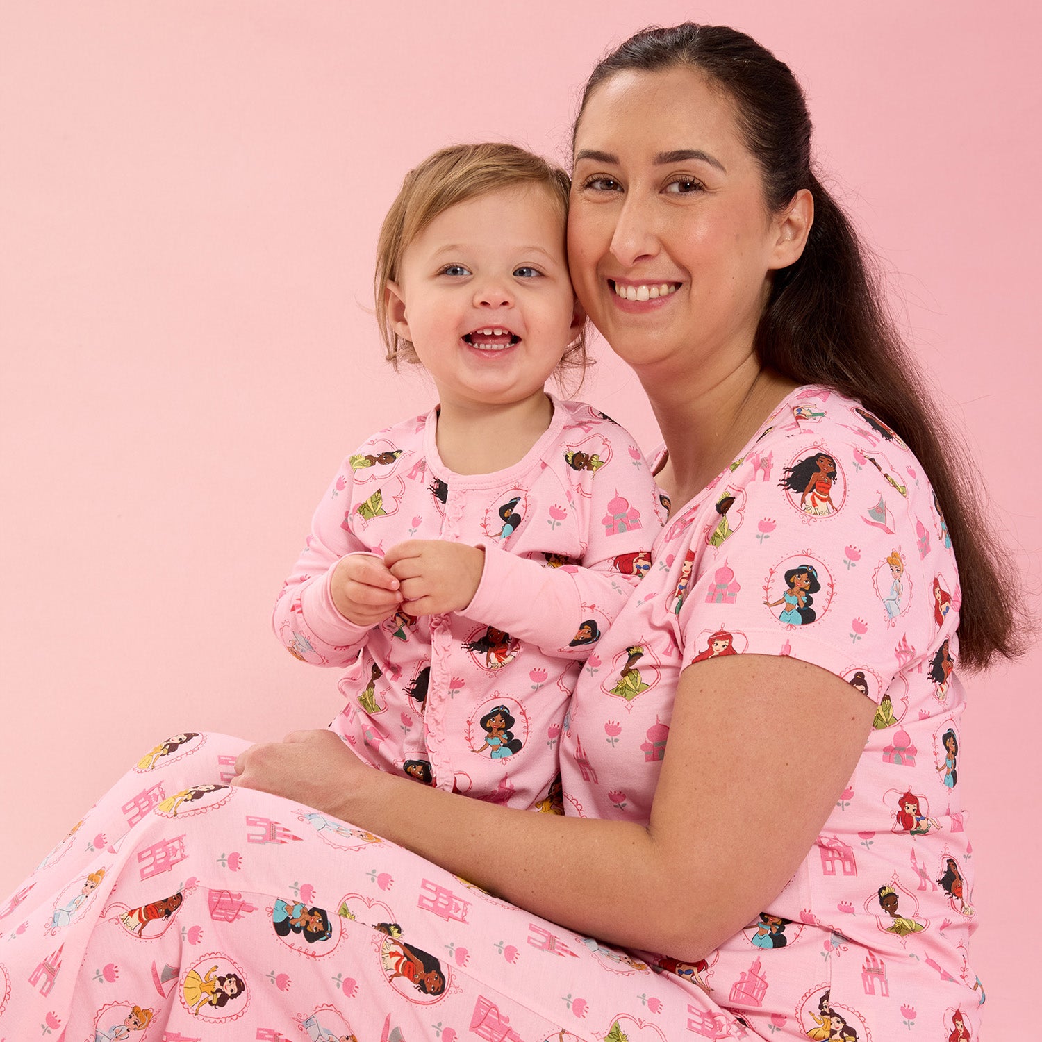 Woman and child wearing matching Princess Royal pink nightwear, by Magnetic Me