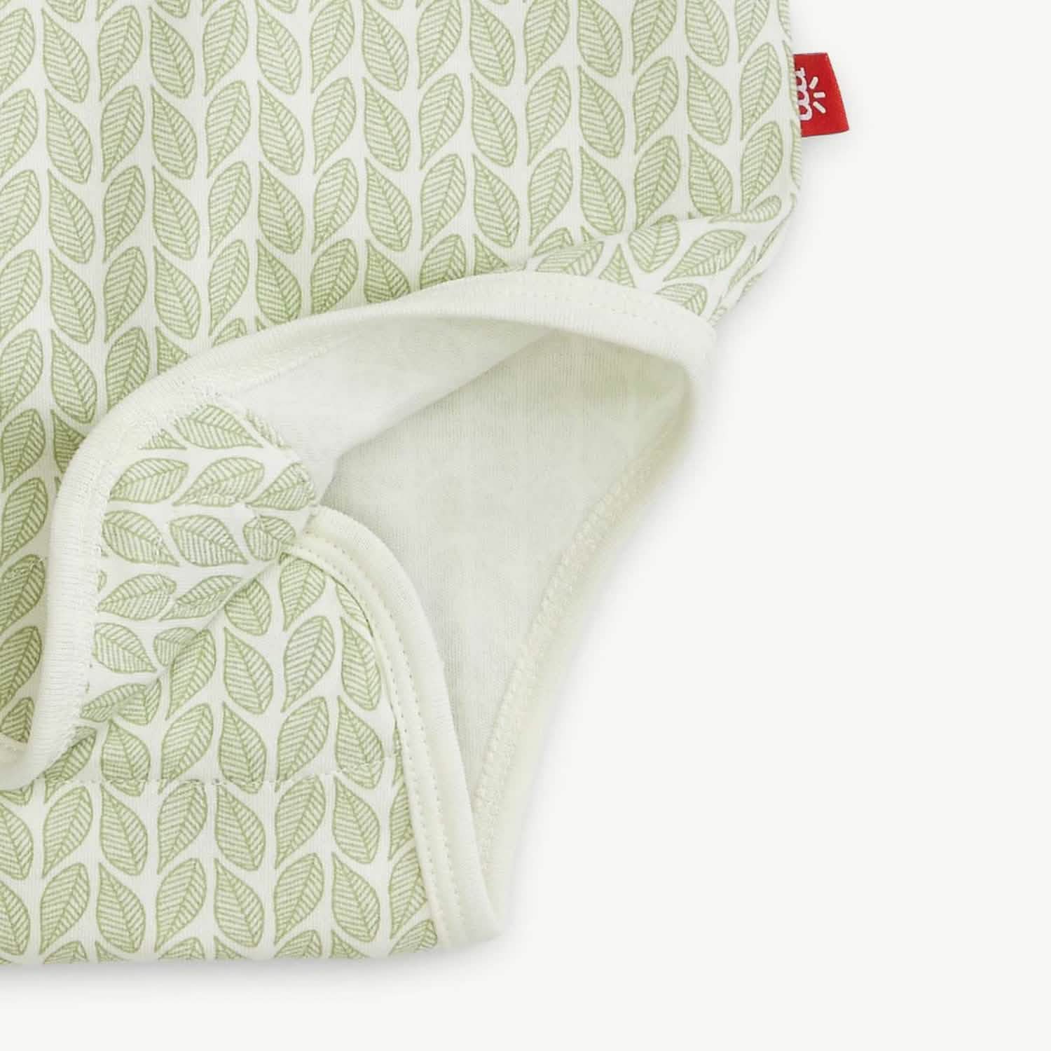 green cable leaf organic cotton magnetic bodysuit