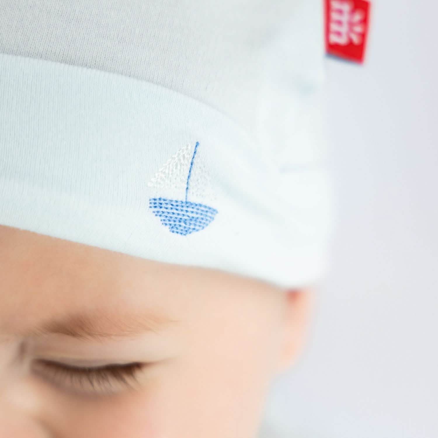 sail-ebrate good times organic cotton magnetic parent favorite footie + hat set