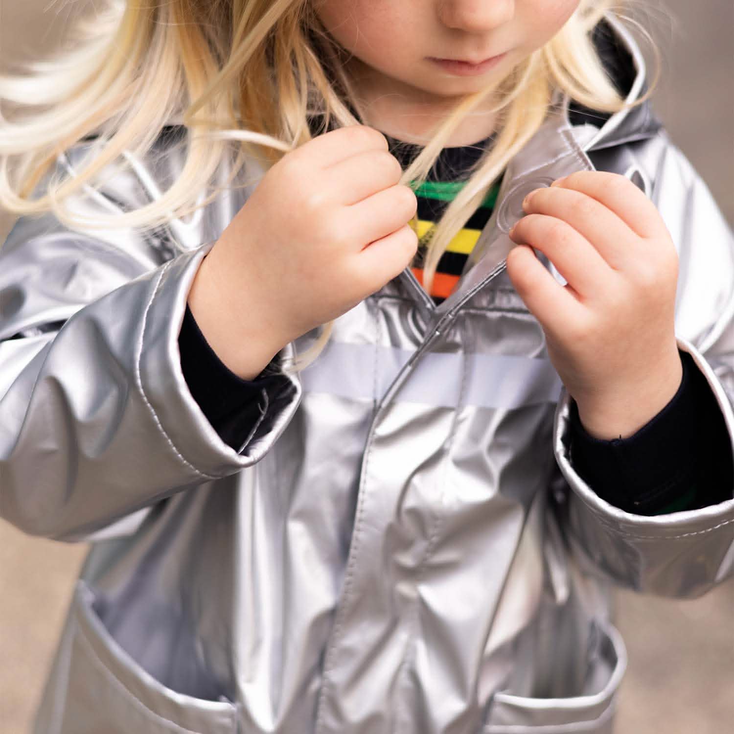 silver metallic magnetic singing in the raincoat